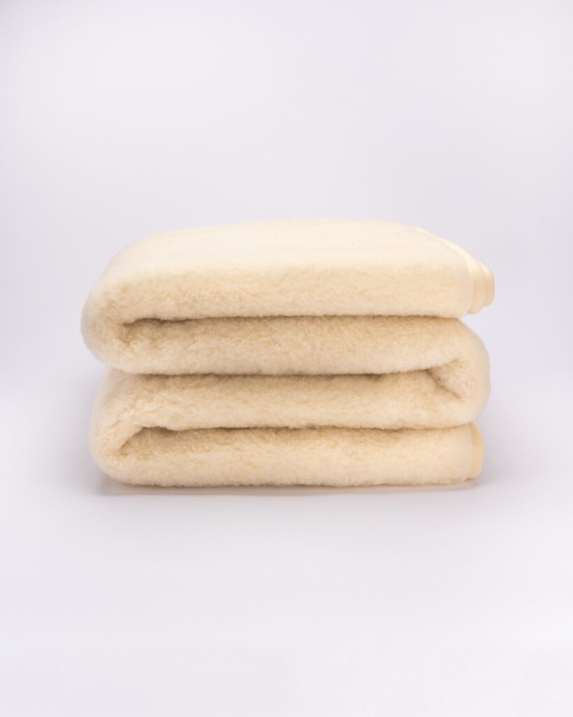 WOOLLAND Kinderdecke aus leichter Merinowolle - Trösterin