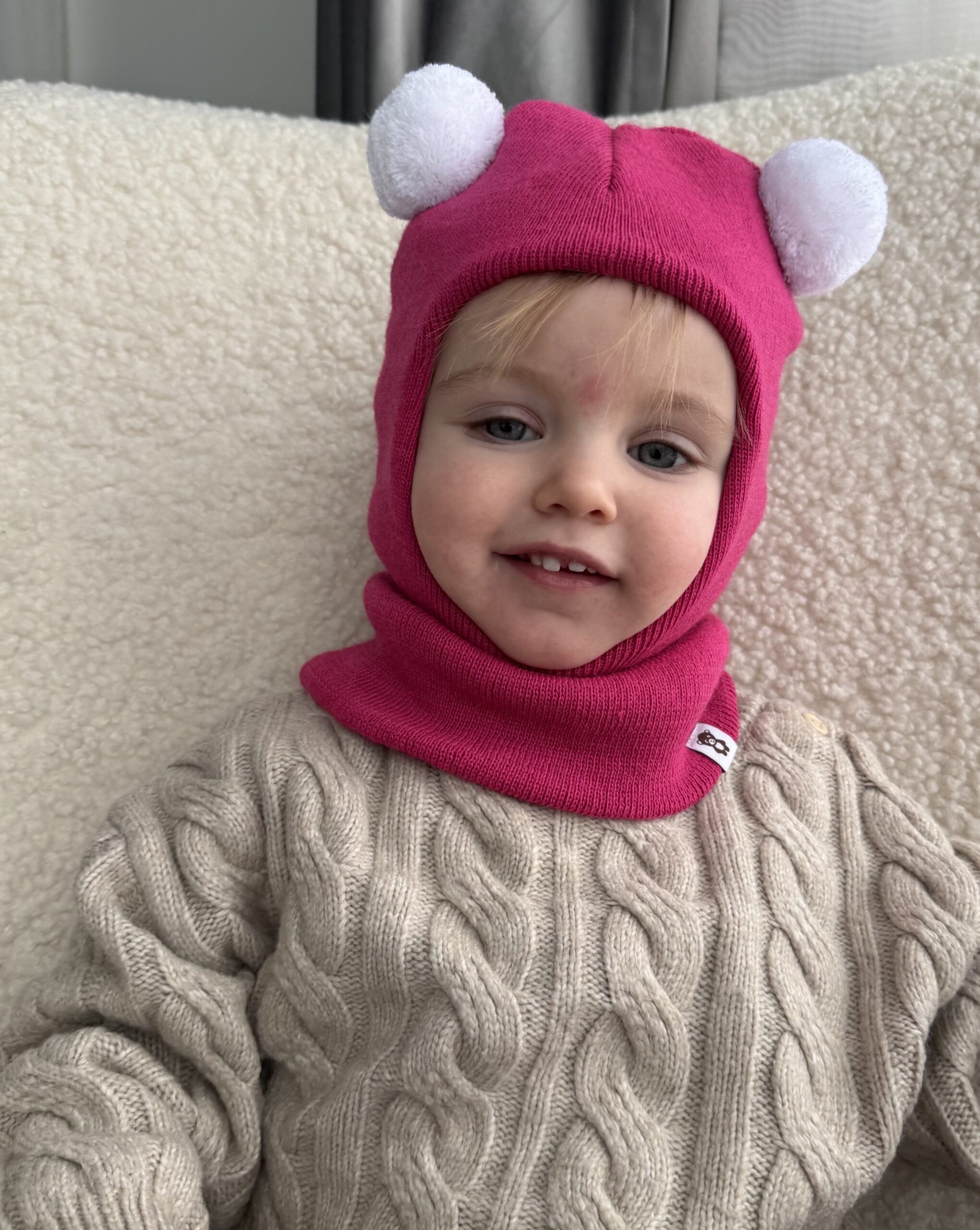 Kinderhelm aus Merinowolle rosa POMPONAS